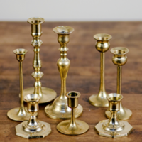 assorted brass candle holders