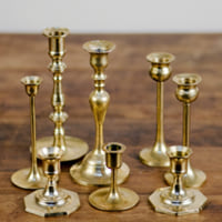assorted brass candle holders